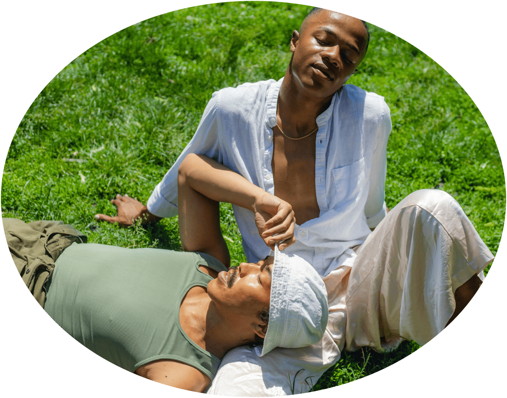 black kids sitting on grass